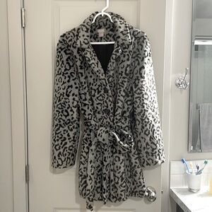 Snow leopard faux fur coat.